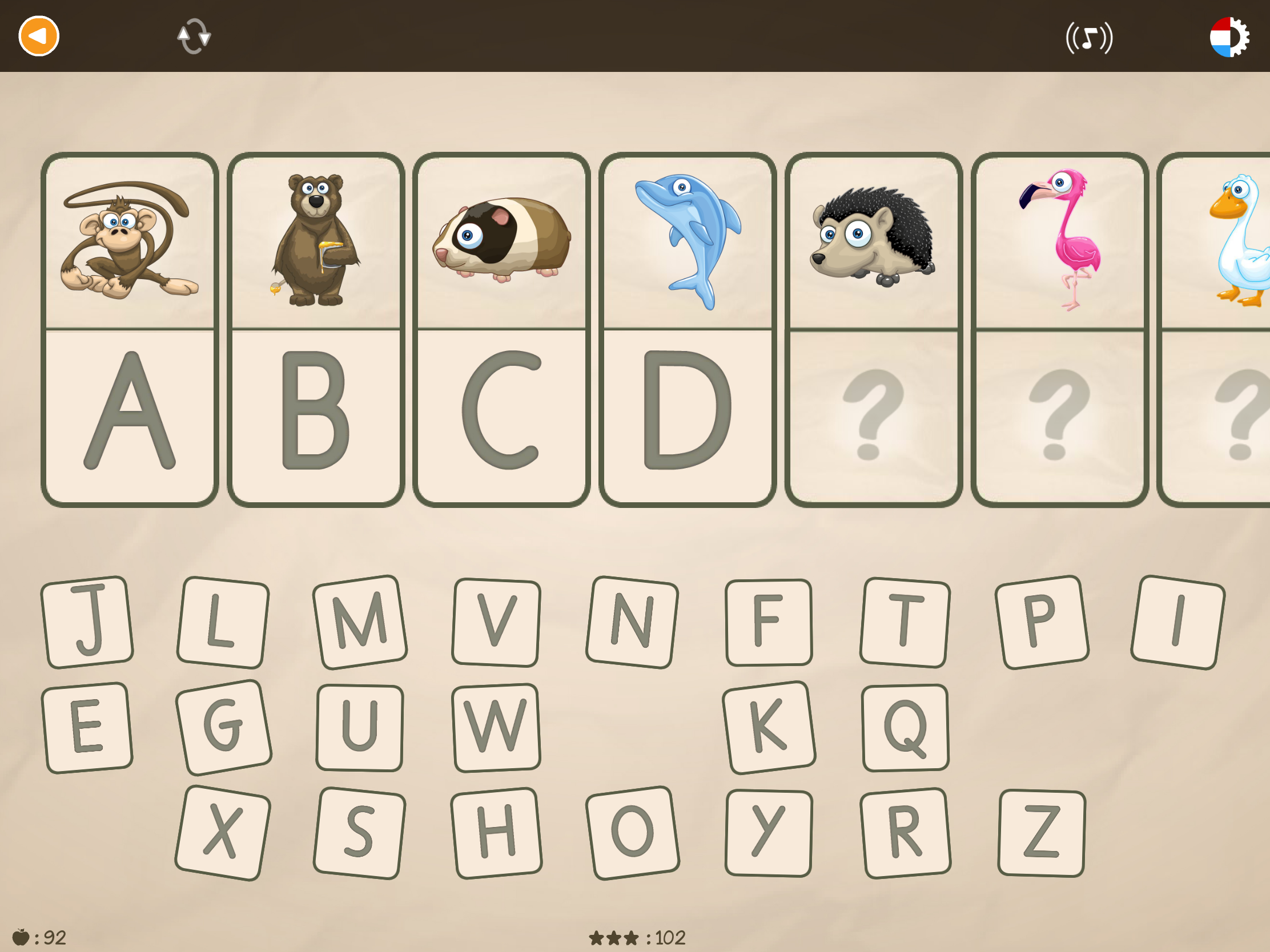 Kind leert het alfabet met dierenillustraties in de educatieve leerapp ABC met Yeti.